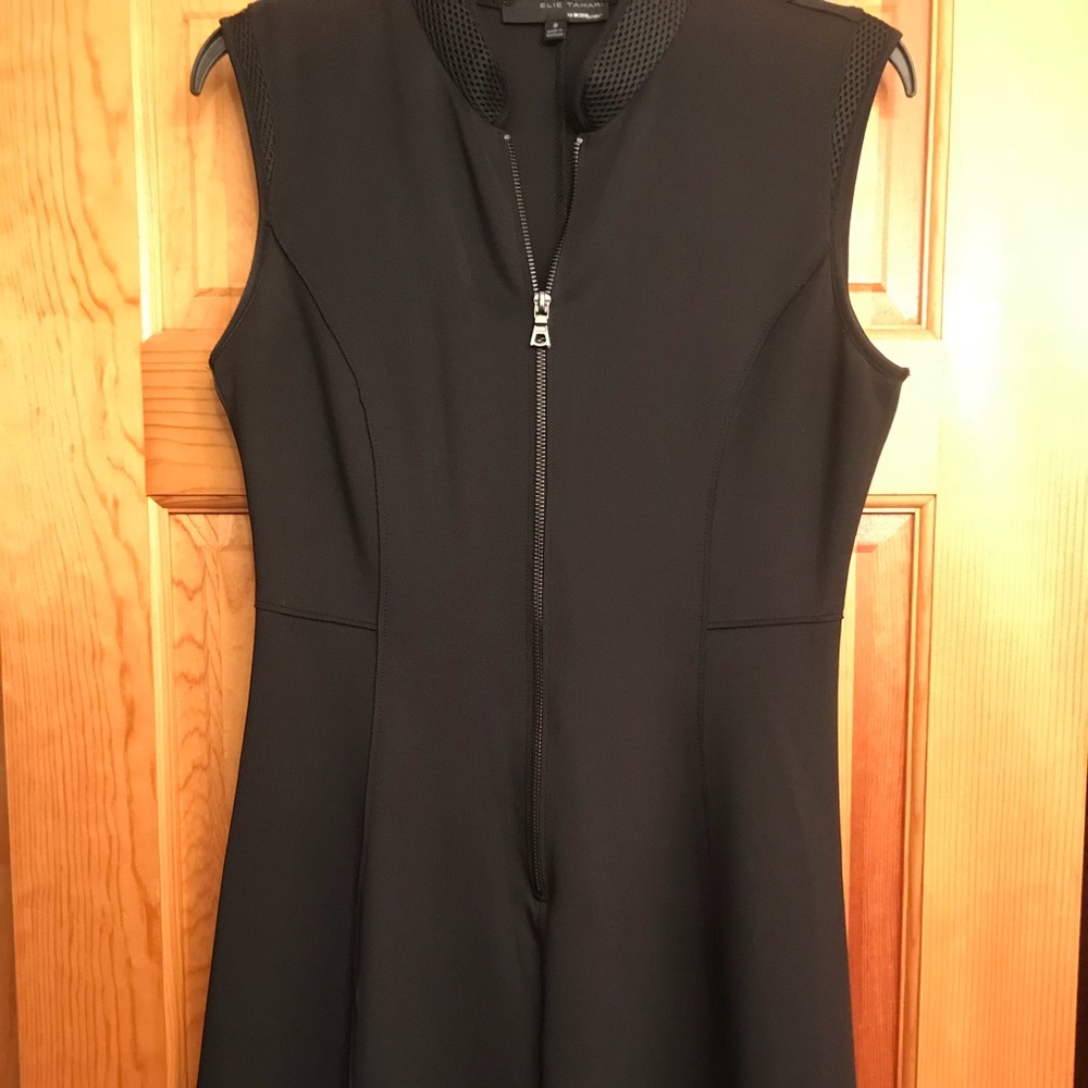 Black summer dress with front zip.